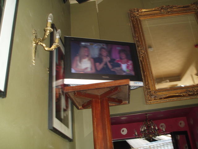 Trying to get a shot of the footy but get the WAGs instead