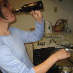 kt sucks one down while stirring the wort