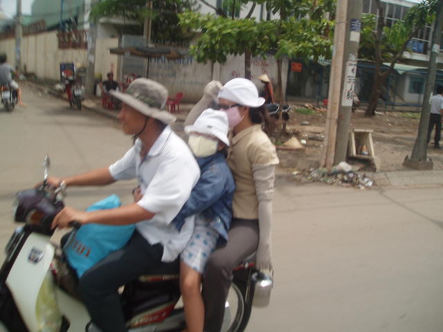 11_family_on_moped.jpg