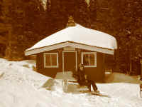 danielle_warming_hut.jpg (156720 bytes)