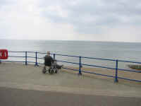 man_wheelchair.jpg (111681 bytes)